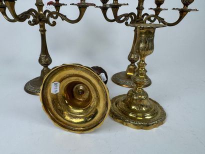 Two pairs of brass torches or candlesticks,...