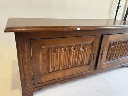 Moulded and carved oak chest opening with...