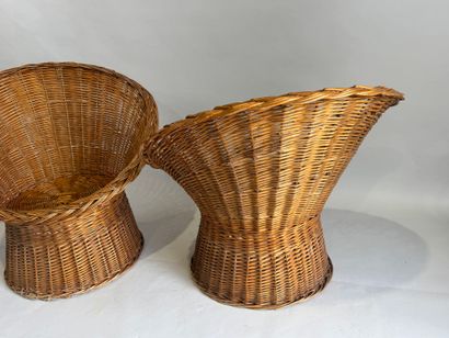 Three wicker armchairs, wraparound back and...