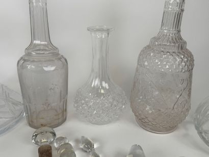 Seven glass and crystal decanters.
H. 30...