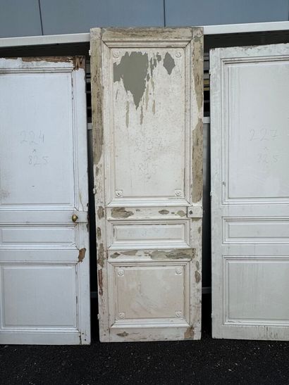 Suite of eight doors in molded and painted...