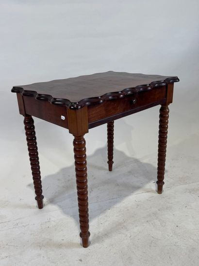 Small stained wood table or desk opening...