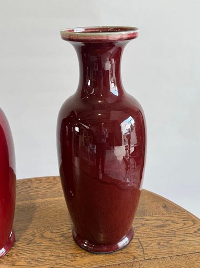 CHINA, 20th century.
Pair of oxblood enameled...