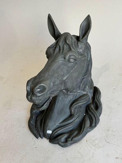 Zinc butcher's sign featuring a horse's head.
40...