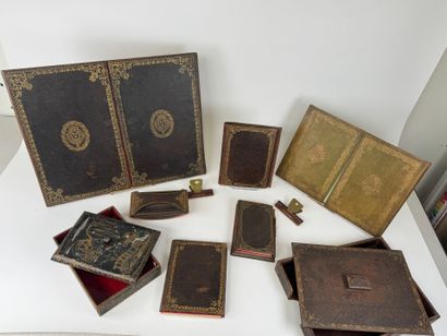 Leather desk set with gold embossed foliate...