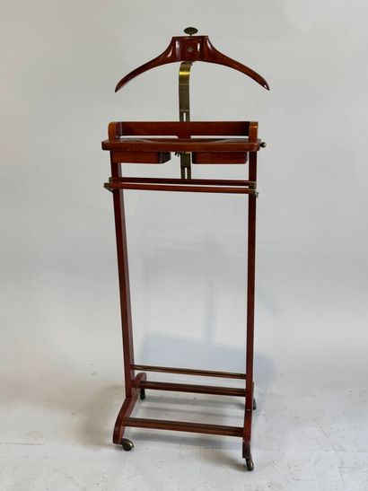 Valet in stained wood and brass. On castors....