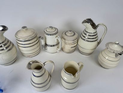 LANGEAIS.
Eight cream and silver earthenware...