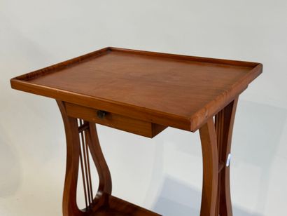 Small cherry wood table opening with a drawer,...