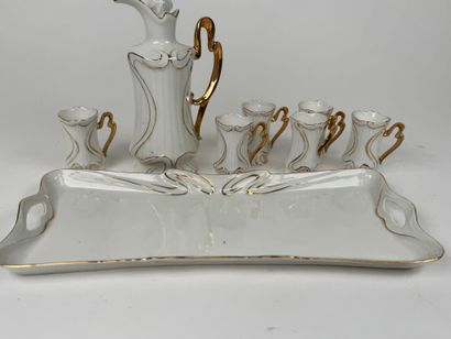 Small white and gold porcelain liqueur service...