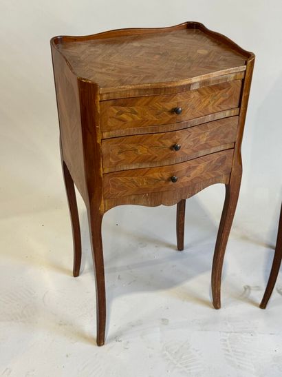 A pair of Louis XV style, molded rosewood...