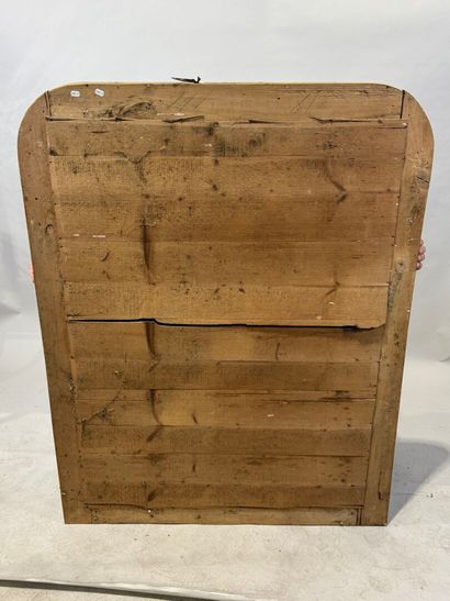 Wood and gilded stucco mirror decorated with...