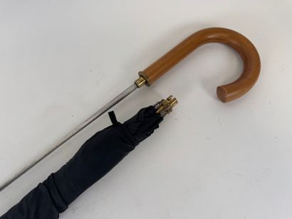 Sword cane umbrella.
L. 92.5 cm.