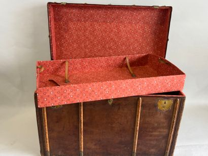 Wooden trunk, leather-covered and reinforced...