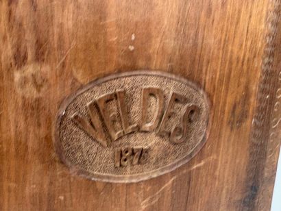 A two-plate folio in carved wood with the...
