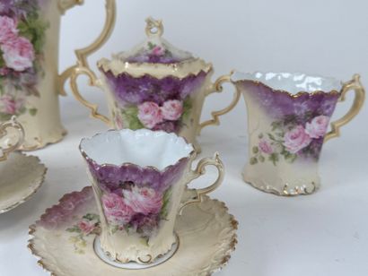 Part of a polychrome and gold porcelain coffee...