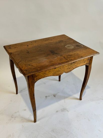 Small rustic table in molded walnut opening...