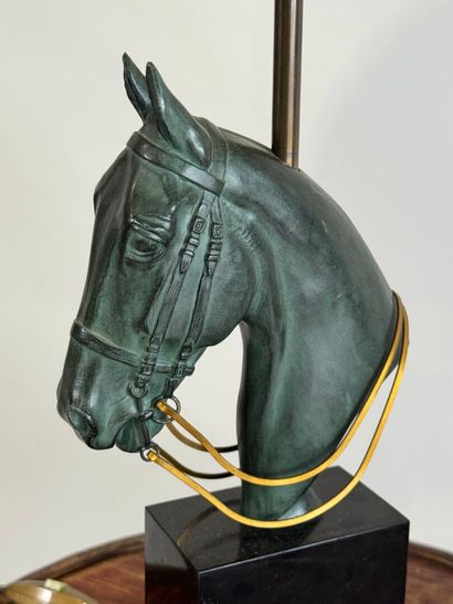 Regula lamp with green patina featuring a...