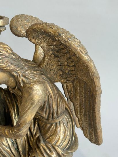 Carved and gilded wood archangel forming...