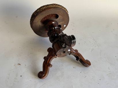 Molded and carved wooden piano stool, circular...