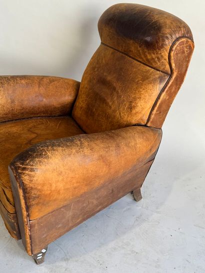 Club armchair in havana leather with arched...