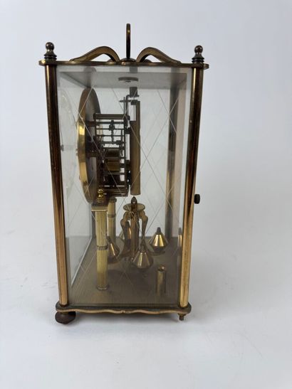 KOMA.
Brass and beveled glass table clock.
25...
