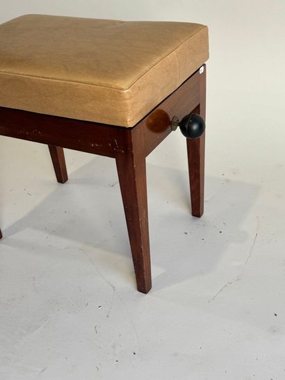 Mahogany veneered piano stool with sheath...