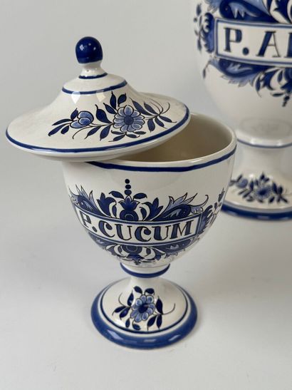 DESVRES.
Four covered medicine jars in blue...