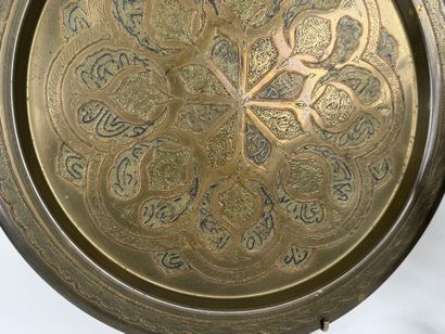 Chased brass gong with painted wooden hammer....