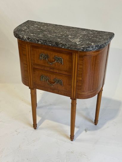 Small half-moon chest of drawers in wood...