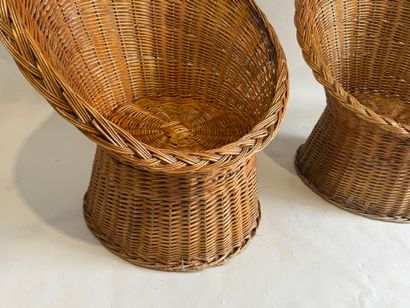 Three wicker armchairs, wraparound back and...