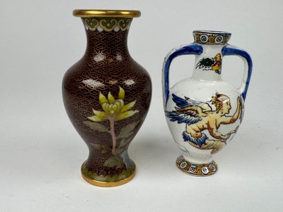 Lot including:
- GIEN.
Small polychrome earthenware...