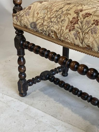 Armchair in stained natural wood, the armrests,...