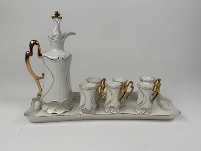 Small white and gold porcelain liqueur service...