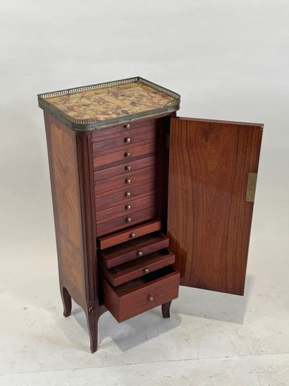 Small medallion cabinet in wood and veneer...