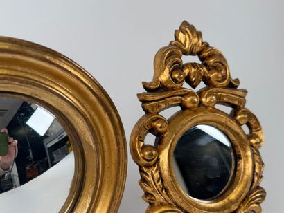 Suite of two mirrors, one of which is a circular...