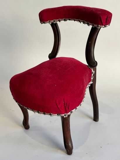 Molded wood chair with red velvet seat cover...