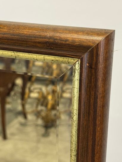 Rectangular mirror in stained wood with gilded...