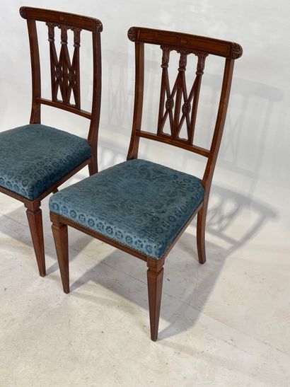 Pair of molded wood chairs with openwork...