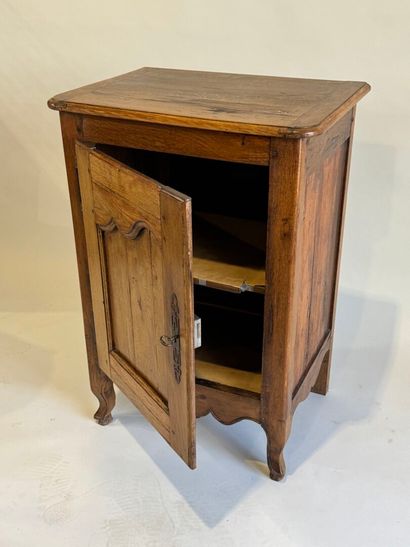 Moulded walnut jam cupboard opening with...