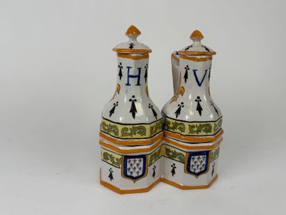 Polychrome earthenware oil and vinegar cruet...