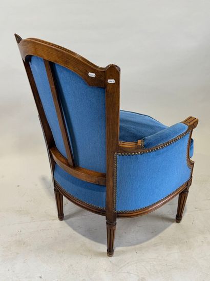 Molded and carved beech armchair, basket-handle...
