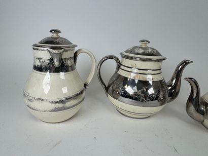 LANGEAIS.
Four cream and silvered earthenware...