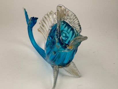 A blown glass subject, partially colored...
