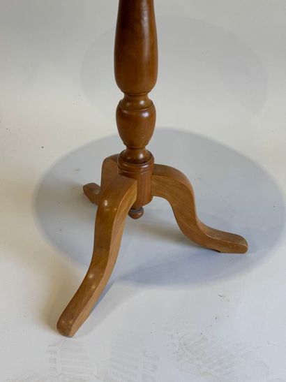 Small circular tripod pedestal table in fruitwood....