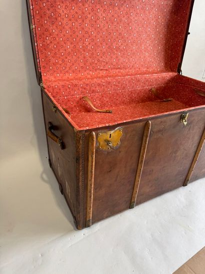 Wooden trunk, leather-covered and reinforced...