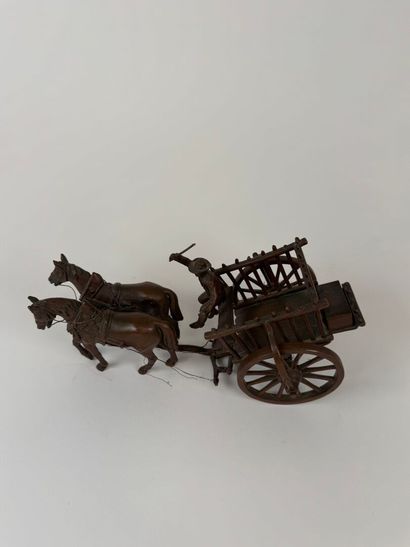 Small regule subject depicting a carriage.
11...