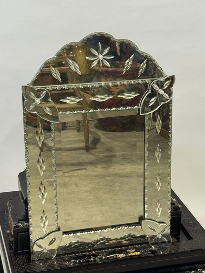 Venice mirror with beveled and chased glass...