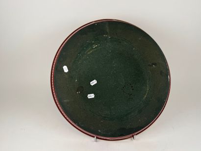 Circular tray in red and gold lacquered metal...