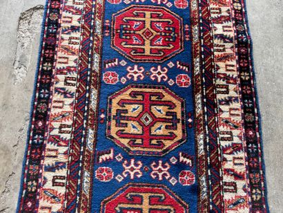 Gallery carpet with blue and beige background...