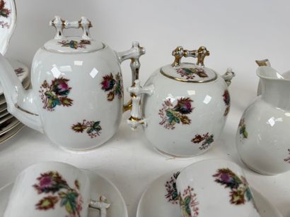 Part of a polychrome and gold porcelain coffee...